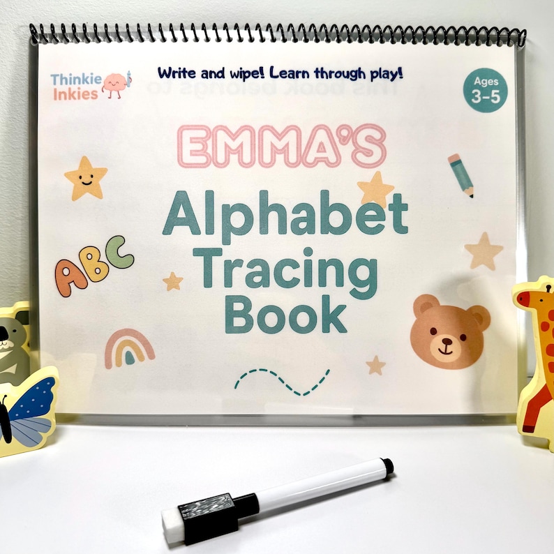 Personalized alphabet tracing book with laminated write-and-wipe pages