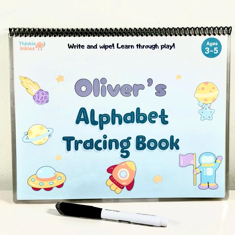 Personalized space alphabet tracing book with dry-erase marker